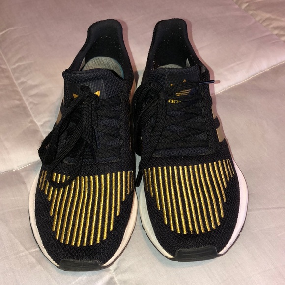 black and gold adidas tennis shoes